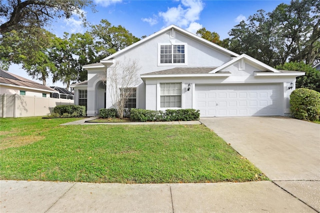 view of front of home featuring a garage and a front lawn