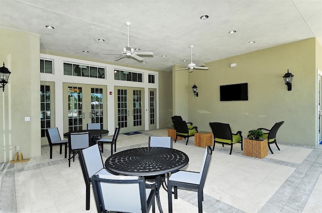 view of patio / terrace with french doors and ceiling fan