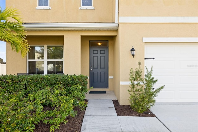 property entrance with a garage