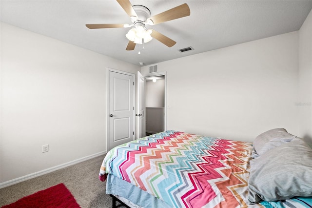 bedroom featuring ceiling fan and carpet floors