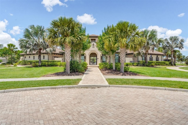 view of front of home with a front lawn