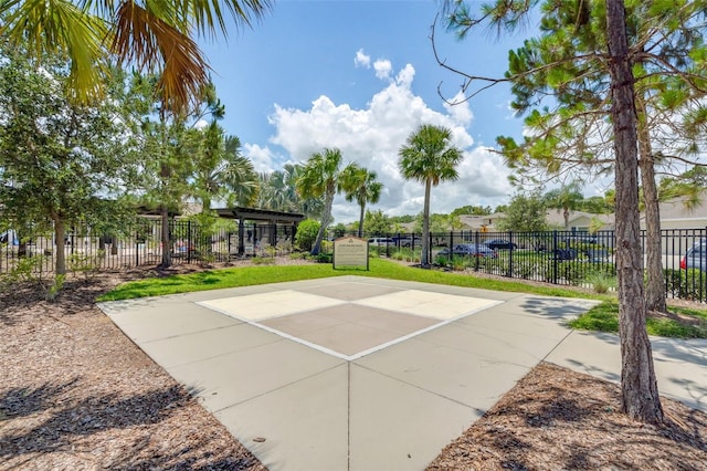 surrounding community featuring basketball court