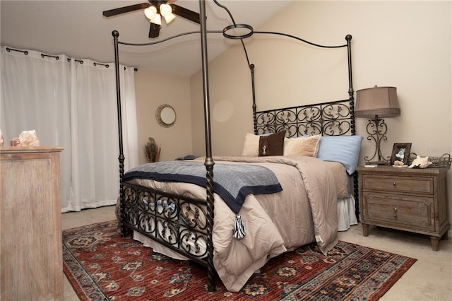 bedroom with carpet, ceiling fan, and lofted ceiling