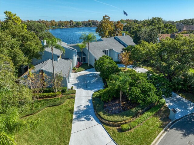 birds eye view of property with a water view