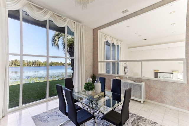 dining area with a water view