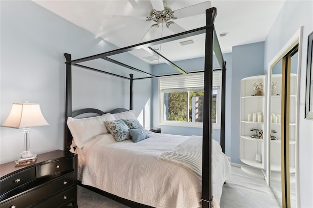 bedroom with ceiling fan and carpet