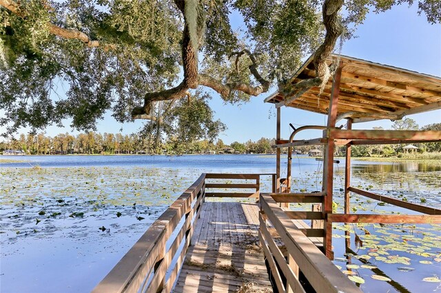 view of dock with a water view