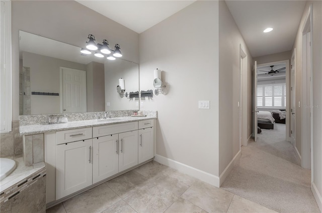 bathroom with vanity, tile patterned flooring, and ceiling fan