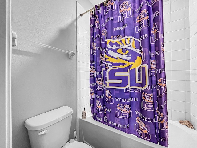 bathroom featuring toilet and shower / bathtub combination with curtain