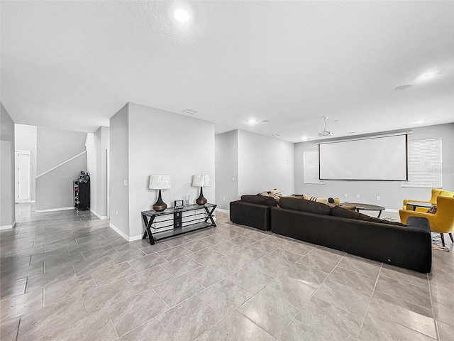 cinema room with recessed lighting, visible vents, and baseboards