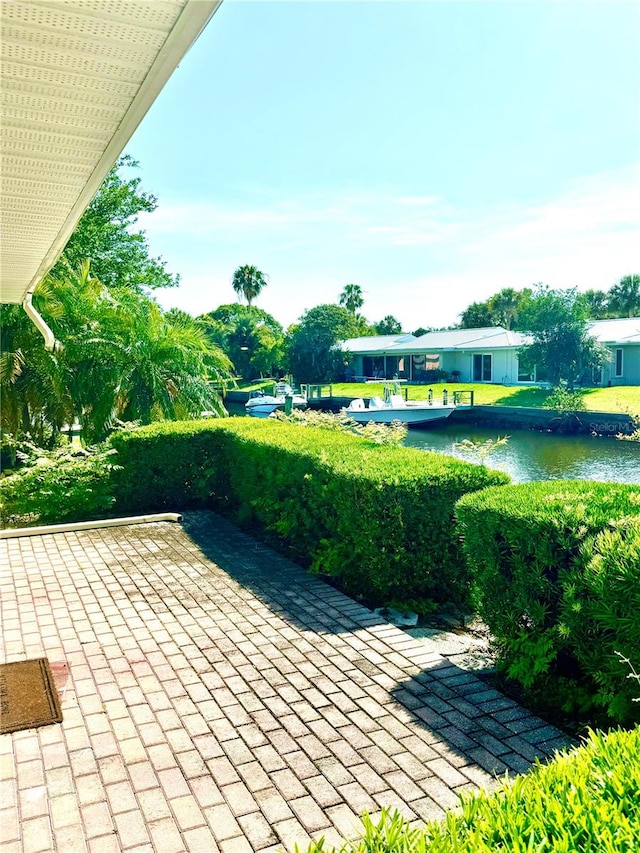 view of patio / terrace featuring a water view