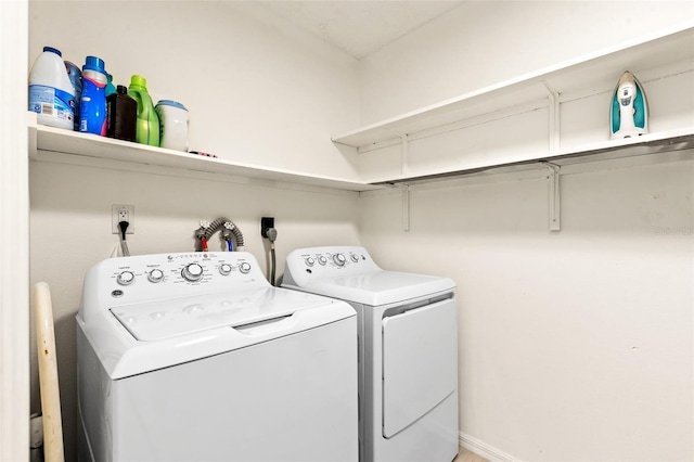 laundry area featuring washer and clothes dryer