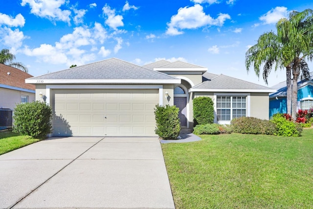 ranch-style house with a front lawn, a garage, driveway, and stucco siding