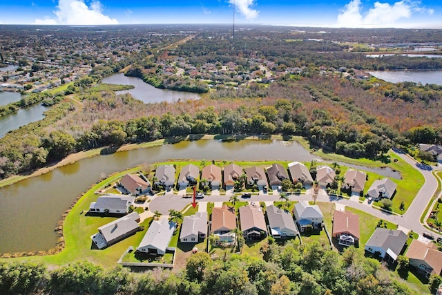 aerial view with a residential view and a water view