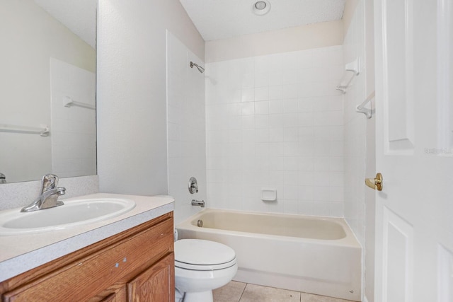 bathroom with tile patterned floors, vanity, toilet, and shower / bath combination