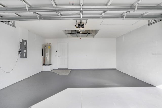 garage with electric water heater, a garage door opener, and electric panel