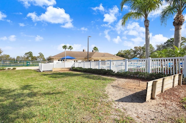 view of yard with fence