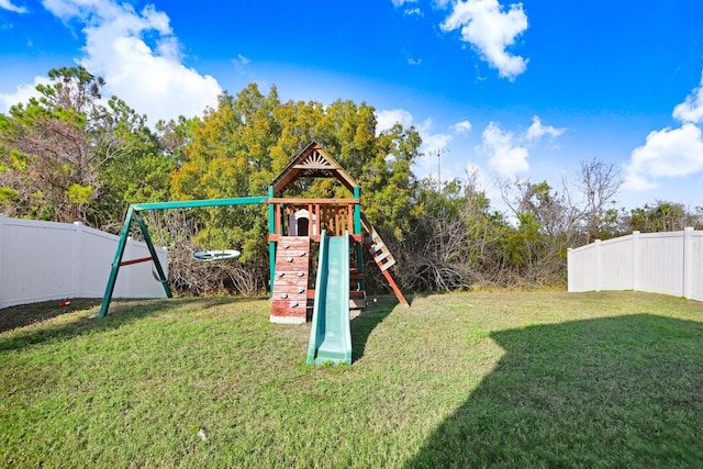 view of play area with a yard