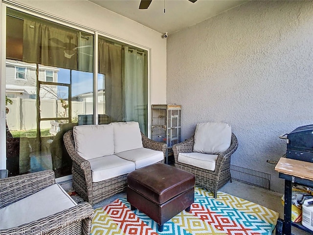 view of patio featuring an outdoor living space and ceiling fan