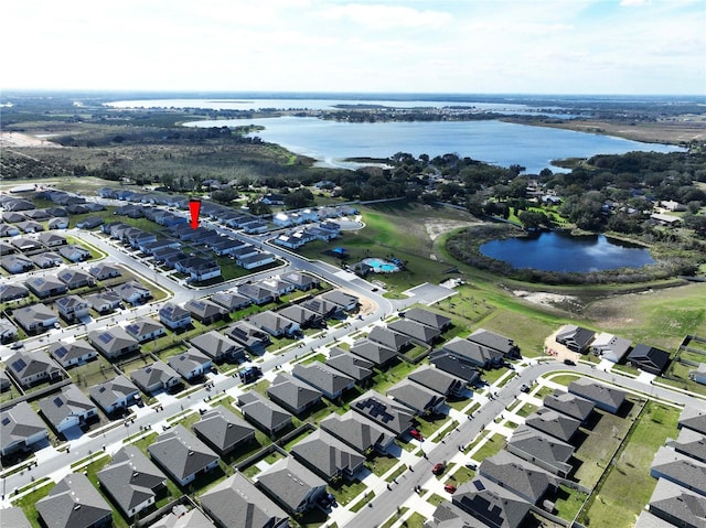 drone / aerial view featuring a water view