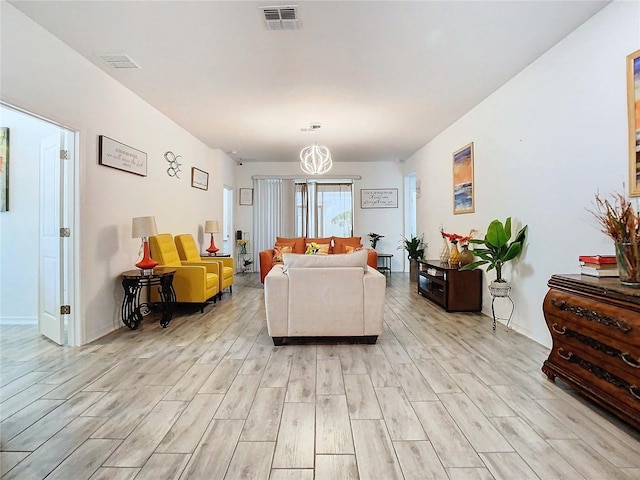 living room with light hardwood / wood-style floors