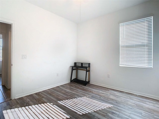 empty room featuring hardwood / wood-style floors