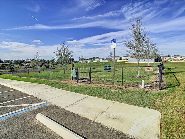 view of community featuring a yard