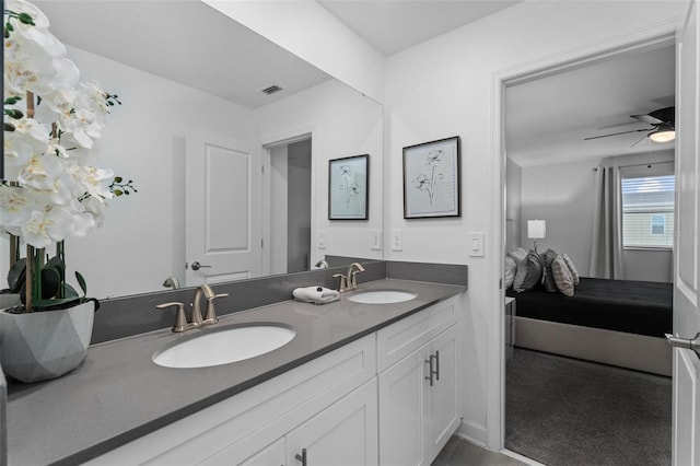 bathroom featuring vanity and ceiling fan