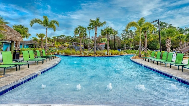 view of pool featuring pool water feature