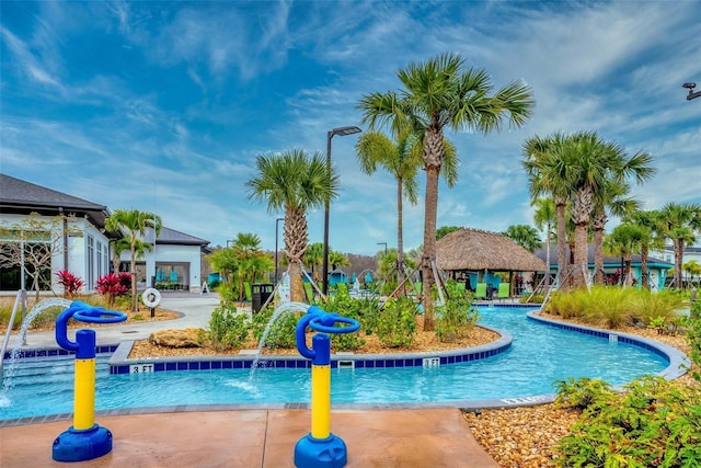 community pool with a gazebo