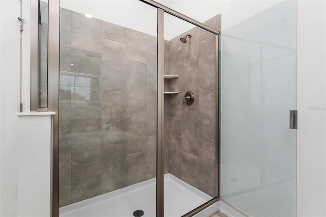 bathroom featuring a stall shower