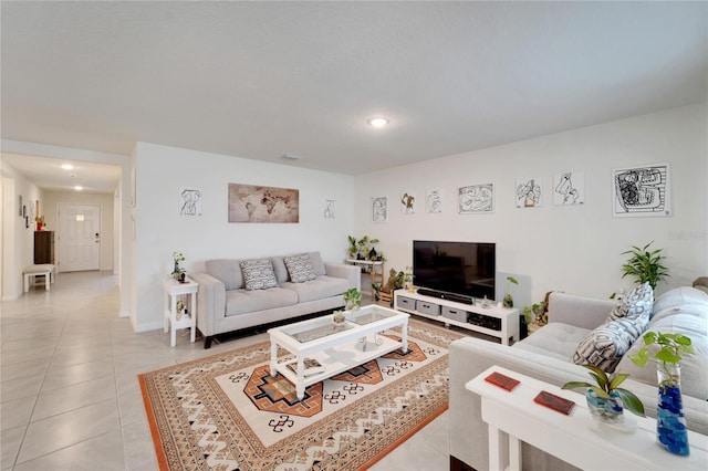 living room with light tile patterned floors