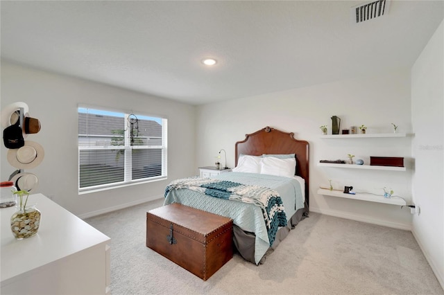 bedroom with light carpet