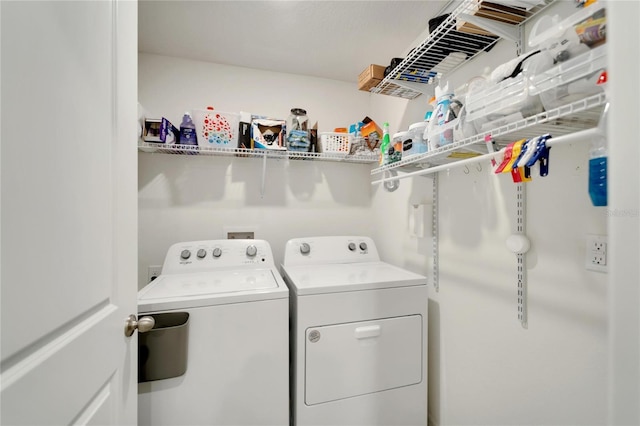 laundry area with washer and clothes dryer