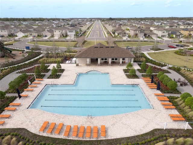 view of swimming pool featuring a patio area