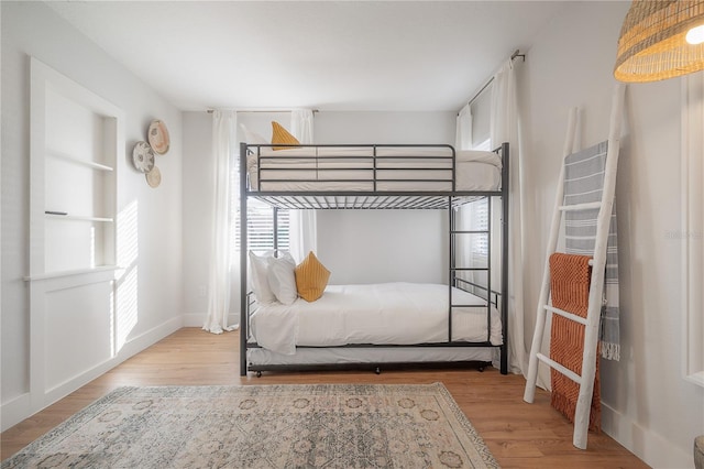 bedroom with light hardwood / wood-style floors