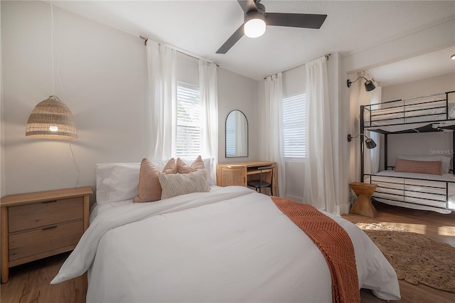 bedroom featuring hardwood / wood-style floors and ceiling fan