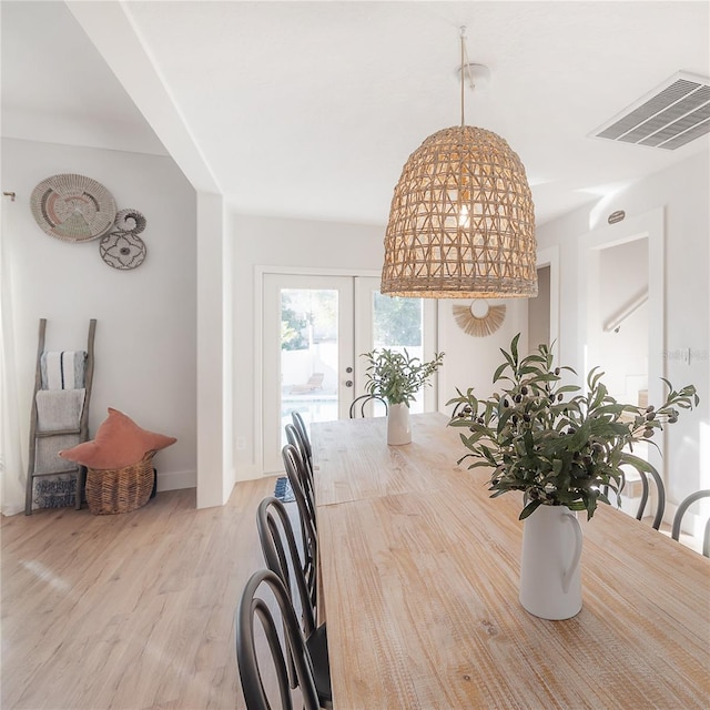 dining space featuring light hardwood / wood-style floors