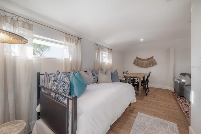 bedroom with light hardwood / wood-style flooring