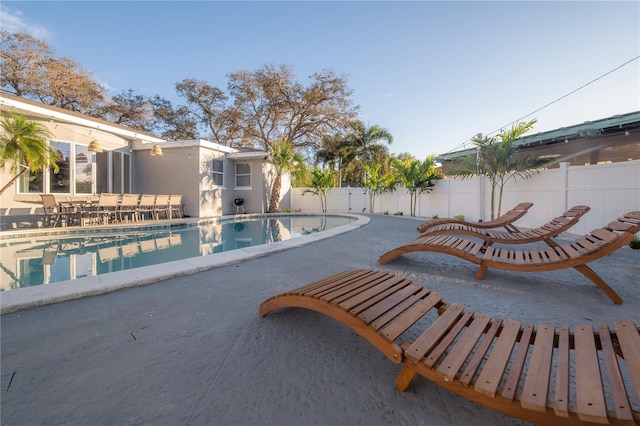 view of pool featuring a patio area