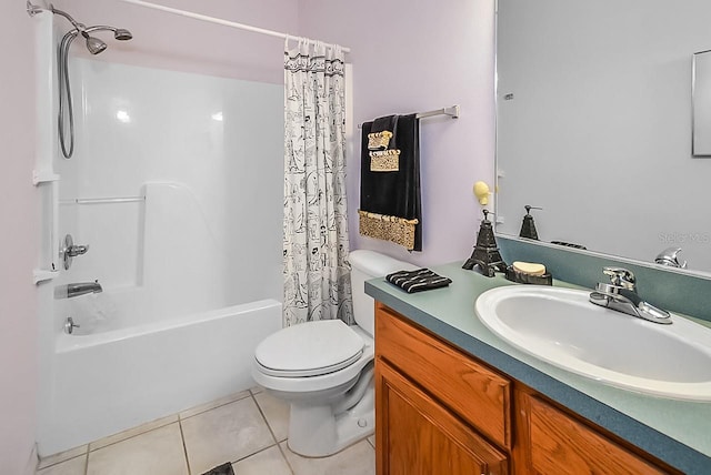 full bathroom featuring toilet, tile patterned flooring, vanity, and shower / tub combo with curtain