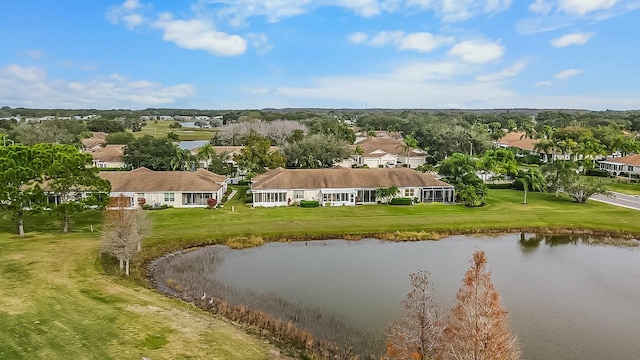 bird's eye view with a water view