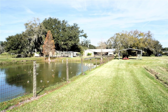 view of yard with a water view