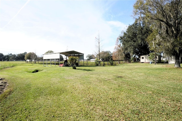 view of yard featuring a carport