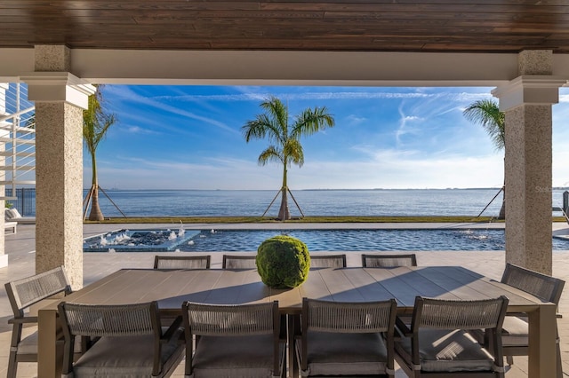 view of patio / terrace featuring a water view