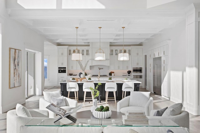 living room featuring beam ceiling