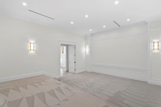 empty room with light carpet and ornamental molding