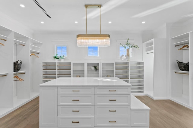 walk in closet featuring light wood-type flooring