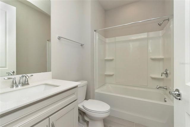 full bathroom featuring bathtub / shower combination, toilet, and vanity