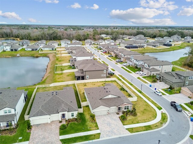 drone / aerial view featuring a water view